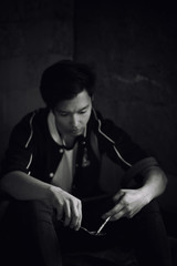 A young man takes drugs