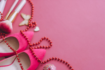 Fashion women accessories on the pink pastel background.