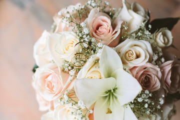 bride placing her wedding ring