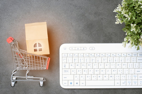 Online shopping Concept. Top view of shopping cart with keyboard for Online shopping. 4