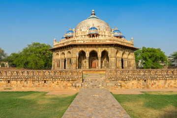 Dramatic view of Isa Khan Niyazi's tomb this octagonal tomb known for its sunken garden was built for a noble in the Humayun's Tomb complex with blue sky. Historical Landmark of Delhi, India