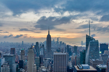 New York skyline from the top of  Top of the Rock (Rockefeller Center)sunset view in Winter with clouds in the sky