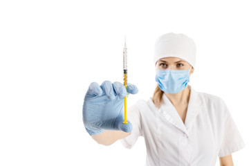 Pretty female doctor wearing white medical robe and holding syringe, health care and pharmacology concept, girl on white uniform.