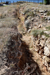 The trench dug in sandstone, the trench of the great Patriotic war, it was reconstructed. Military shelter is an artificial structure designed to improve shooting conditions and protect a soldier.