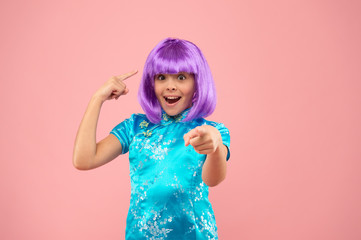 wow. chinese new year. stylish child in kimono. child wear national robe. festival day in Japan. asian girl violet hair wig. small chinese girl in purple wig. happy kid in traditional Chinese gown