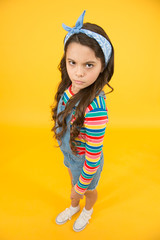 be stylish in any mood. female accessory for trendy spring. childhood happiness. child has long curly hair. unhappy little girl wear retro headscarf. summer kid fashion