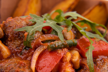 
stewed potato wedges with vegetables for restaurant menu3