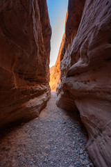 Slot Canyon Ends at Bright Orange Light