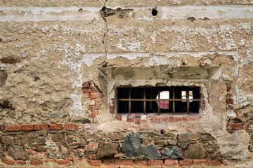 Old wall with a window