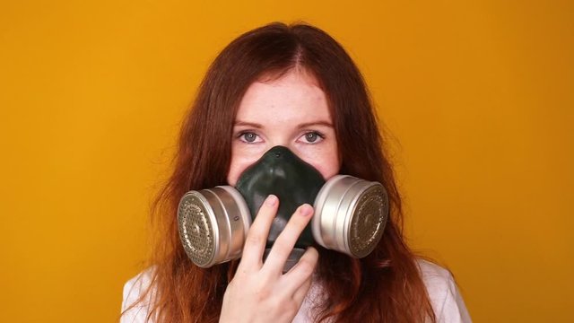 Woman use respirator for protection against coronavirus 2019-nCoV