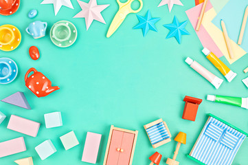 Colorful kids zero waste toys over bright background. Children gender neutral development and educational games, family activities at home during quarantine.Flat lay, top view