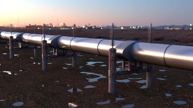 Evening or early morning scene with stainless natural gas pipeline or petrol oil pipeline against the small rural town with oil production workers. Is a business of transfer crude oil to storage tank.
