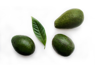 Avocado isolated on white. Three fruits. Different varieties of avocado.