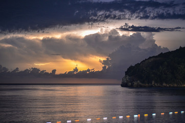 Fototapeta premium a beautiful sky above the sea rich in stars and lightning
