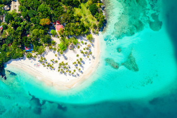 Aerial drone view of beautiful caribbean tropical island Cayo Levantado beach with palms. Bacardi...