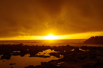 Beautiful sunset in Madalena, Pico, Azores islands. Panoramic landscape view to the ocean.