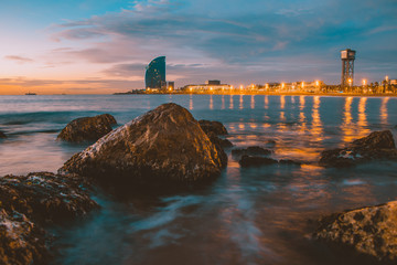 Beautiful sunrise on the beach, Barcelona, Spain. Amazing colors, sea, sun and positive vibes in...