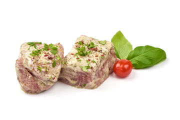 Raw pork kebab in mayonnaise sauce, isolated on white background