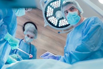 Worried surgeon during the operation stock photo
