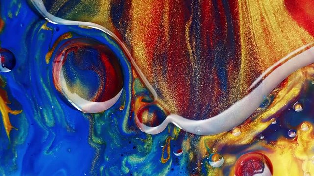 Multicolored Bubbles Of Bright Collors Moving In Paint Oil Surface Beautiful Blue Universe Of Color Slow Motion Macro Red Blue Black And Yellow