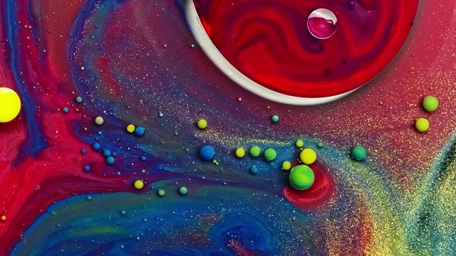 Multicolored Bubbles Of Bright Collors Moving In Paint Oil Surface Beautiful Blue Universe Of Color Slow Motion Macro Red Blue Black And Yellow