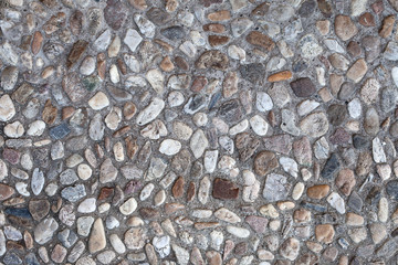 Pebble stones texture. Wash concrate covering texture. Surface of washbeton. Stony wallpaper. Beton pavement surface. Tumbledstones pattern. In german language: "Waschbeton". Cobble stone concrete.