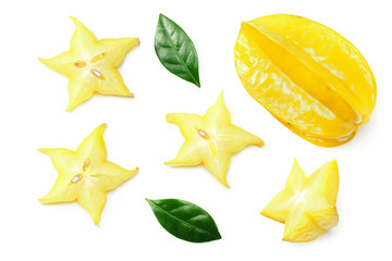 Fototapeta premium Yellow Carambola with green leaves and slices isolated on white background. top view