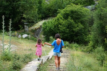 mom and daughter on vacation in Vikos-Aoos national park in Epirus