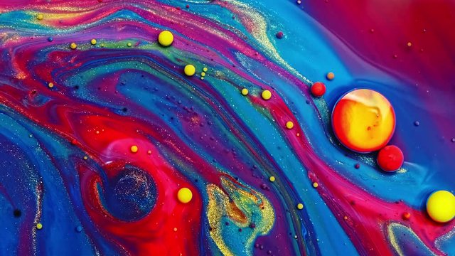 Multicolored Bubbles Of Bright Collors Moving In Paint Oil Surface Beautiful Blue Universe Of Color Slow Motion Macro Red Blue Black And Yellow