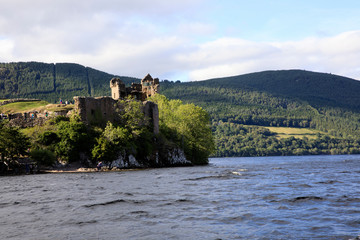 Fototapeta na wymiar Loch Ness (Scotland), UK - August 02, 2018: Urquhart castle at Loch Ness lake, Scotland, Highlands, United Kingdom