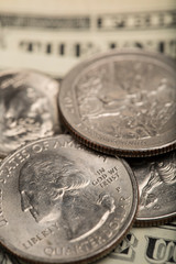 Macro photography of United States dollars and coins for currency exchange