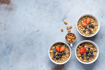 Tasty Strawberry Dessert, Homemade Granola with Strawberries, blueberries, raspberries and red currants. Seeds, Healthy Breakfast, Parfait in a Jar over Bright Background