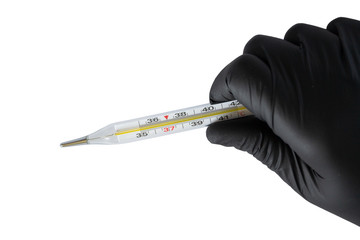 thermometer in hand with a black glove