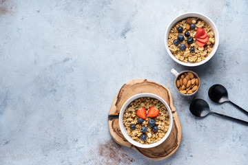 Tasty Strawberry Dessert, Homemade Granola with Strawberries, blueberries, raspberries and red currants. Seeds, Healthy Breakfast, Parfait in a Jar over Bright Background