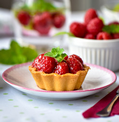 mini tarts with raspberries fruits
