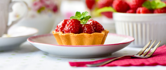 mini tarts with raspberries fruits