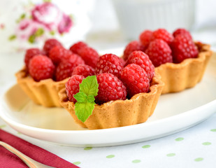 mini tarts with raspberries fruits