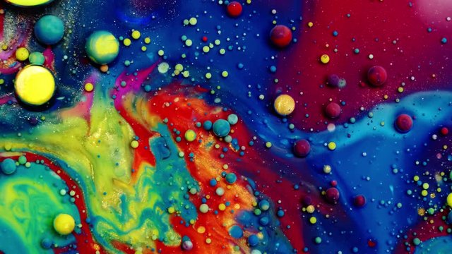 Multicolored Bubbles Of Bright Collors Moving In Paint Oil Surface Beautiful Blue Universe Of Color Slow Motion Macro Red Blue Black And Yellow