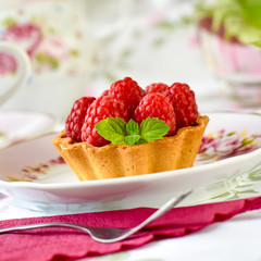 mini tarts with raspberries fruits