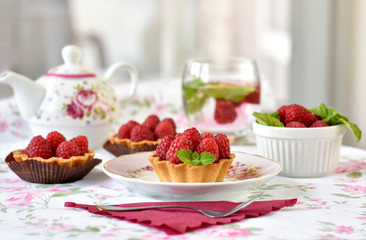 mini tarts with raspberries fruits