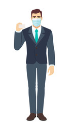 Businessman with medical mask shows the business card. Full length portrait of Businessman in a flat style.