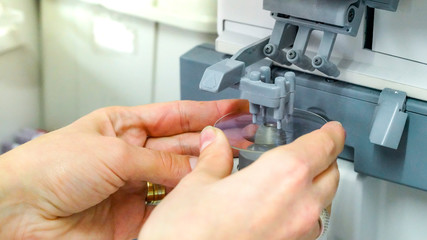 Lens manufacturing in modern laboratory.