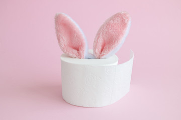 Bunny ears out of toilet paper roll abstract, easter holiday 2020 during covid-19 epidemic.