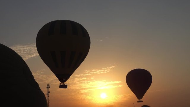 Preparation of hot-air balloons before flying at sunrise, 4k