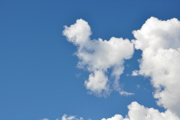 Naklejka na ściany i meble Beauty white cloud and clear blue sky in sunny day texture background