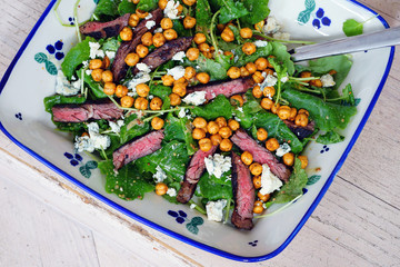 Fresh green kale salad with sliced beef
