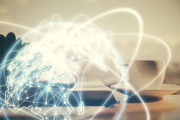 Double exposure of business theme drawing and desktop with coffee and items on table background....