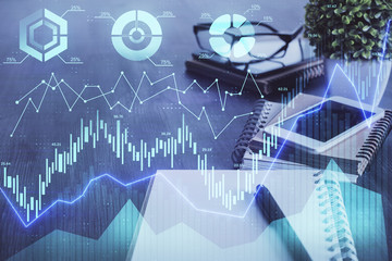 Double exposure of forex chart drawing and cell phone background. Concept of financial trading