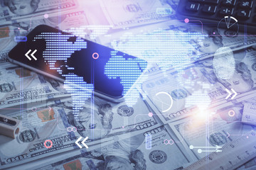 Double exposure of world map drawing over us dollars bill background. International concept.