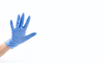 Hand in blue medical glove, five fingers, palm open hand. Medicine, hygiene, virus protection and COVID-19 coronavirus pandemic concept. Copy space. Place for your text